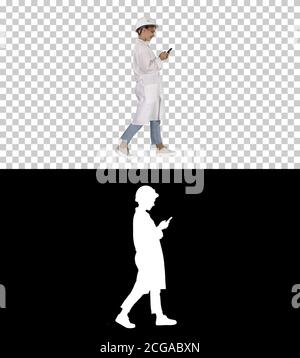 Female Scientist Using Smartphone Walking, Alpha Channel Stock Photo