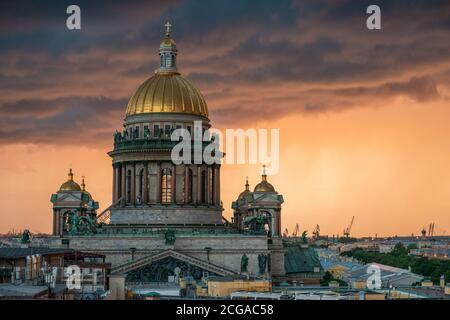 View of St. Isaac's Cathedral, Saint Petersburg city, Russia. Storm clouds on the horizon, beautiful cityscape in a thunder Stock Photo