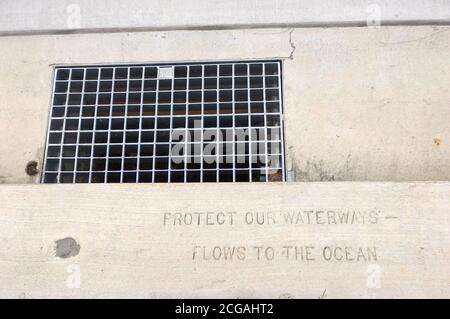 Storm drain grate, with a message to keep our waterways clean, Queensland, Australia Stock Photo