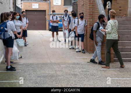 NEW YORK, NY – SEPTEMBER 09, 2020: Students attend first day of in-person learning at Catholic schools in the Archdiocese of New York. Stock Photo