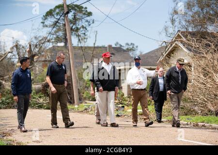 President Donald J. Trump visits a neighborhood Saturday, August 29, 2020, in Lake Charles, Louisiana, to view damage caused by Hurricane Laura. (USA) Stock Photo