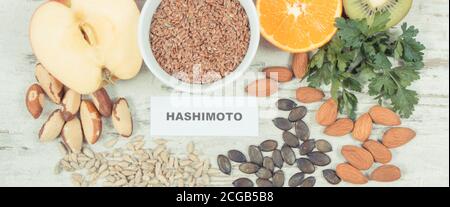 Inscription hashimoto with beneficial nutritious eating for thyroid gland. Healthy ingredients containing natural vitamins and minerals Stock Photo