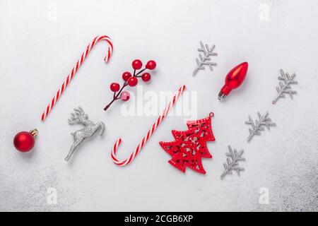 Christmas composition with red and silver gifts on stone background. Xmas holiday 2021 celebration. Flat lay, top view, copy space - Image Stock Photo