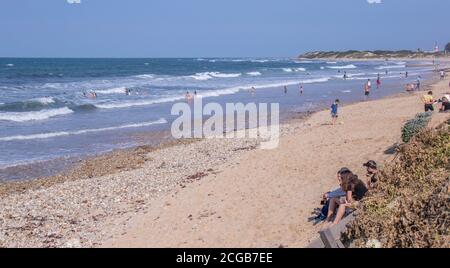 Port Elizabeth South Africa - residents enjoy an afternoon out in early spring on Summerstrand beach Stock Photo