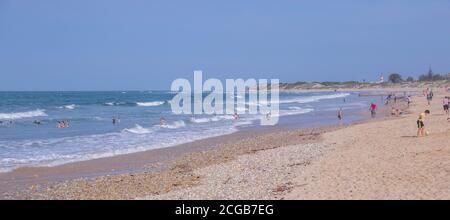 Port Elizabeth South Africa - residents enjoy an afternoon out in early spring on Summerstrand beach Stock Photo