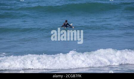 Port Elizabeth South Africa - residents enjoy an afternoon out in early spring on Summerstrand beach Stock Photo