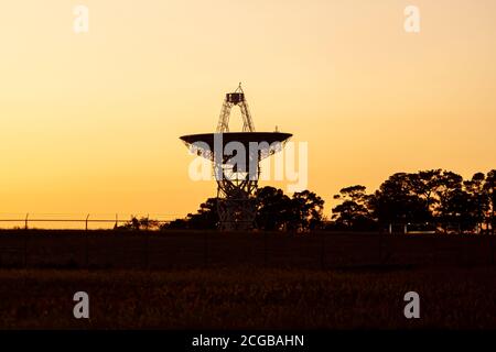 Close up isolated silhouette image of a large radio telescope antenna used for deep space exploration in Wallops Flight Facility of NASA The large sat Stock Photo