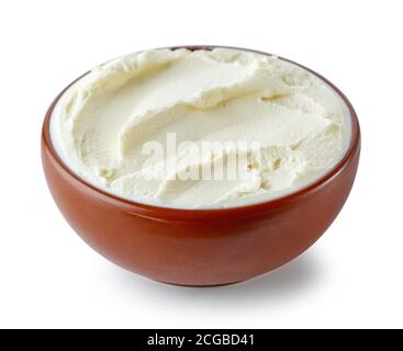 bowl of cream cheese isolated on white background Stock Photo