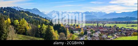 Nice falltime landscape in the bavarian Allgäu near Burgberg with snow-covered mountains in background Stock Photo