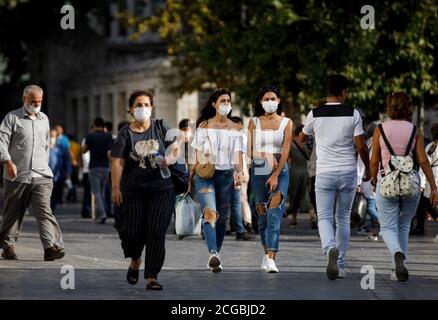 Istanbul, Turkey. 9th Sep, 2020. People wearing masks walk on the street in Istanbul, Turkey, Sept. 9, 2020. Turkey's biggest city Istanbul on Wednesday adopted a series of new restrictions as part of the government's efforts to stem the surging daily number of COVID-19 cases. The Istanbul governor's office said at a written statement that citizens, without any exception, should wear their masks in public places, streets, avenues, parks, gardens, picnic areas, beaches, public transport, workplaces, and factories all the time. Credit: Huseyin/Xinhua/Alamy Live News Stock Photo