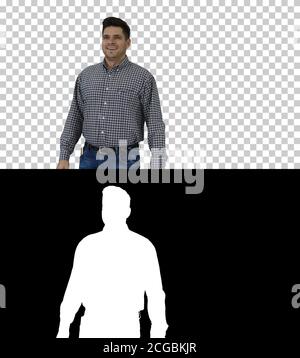 Smiling worker doing ok gesture with hammer in hand, Alpha Channel Stock Photo