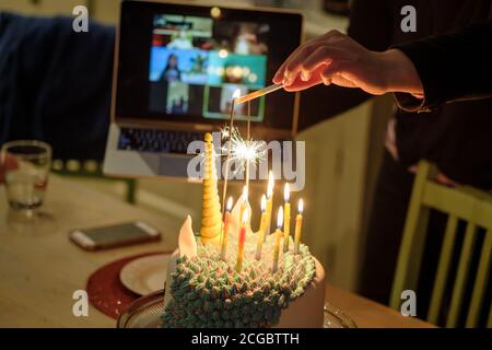 A child's Birthday party being held online (Zoom) during COVID-19 lockdown, Melbourne Australia Stock Photo