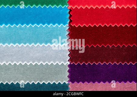 Top down view of gradient colored fabric velvet samples with jagged edges Stock Photo