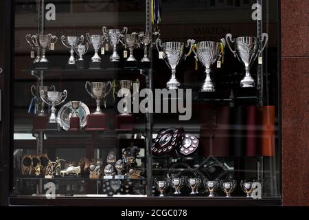 Trophies in a shop window Stock Photo