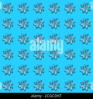 Creative seamless pattern of shiny holographic children's toy wind spinner on blue background. Stock Photo