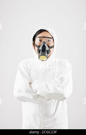 Man in protective clothing and gas mask Stock Photo