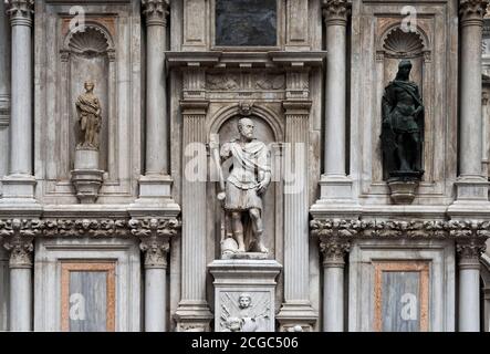 The gothic architectural details and classical statues of the facade of Doge's Palace in Venice, Veneto, Italy. Stock Photo