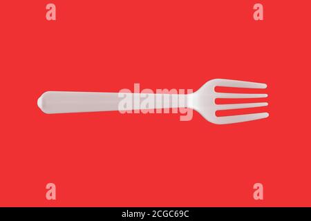 One plastic white fork on a red background Stock Photo