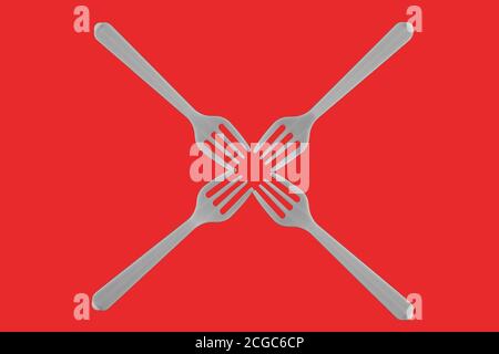 four plastic white forks on a red background Stock Photo
