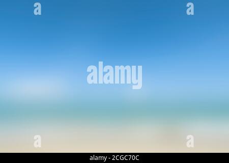 Blurred background of blue sky, emerald sea and golden beack. Blurred background with natural day tone. Stock Photo