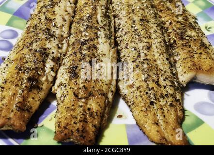 Salmon fillets with seeds, food prepared in restaurant Stock Photo