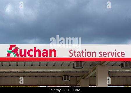 Guilherand-Granges, France - October 17, 2019. Gas station with logo of french retailer Auchan is seen in Guilherand-Granges. Stock Photo