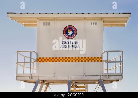 Mandurah, Western Australia - August, 2020: Colorful Surf Life Saving tower in Mandurah town beach on blue sky background. Stock Photo