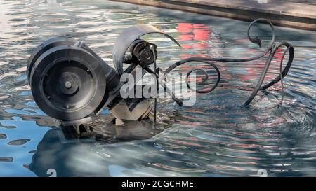 A strange machine in the water basin Stock Photo