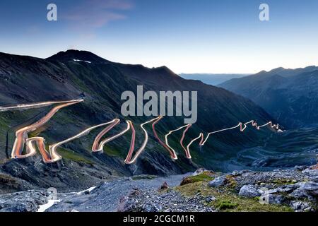The Stelvio pass road at dawn. Trafoi valley, Bolzano province, Trentino Alto-Adige, Italy, Europe. Stock Photo