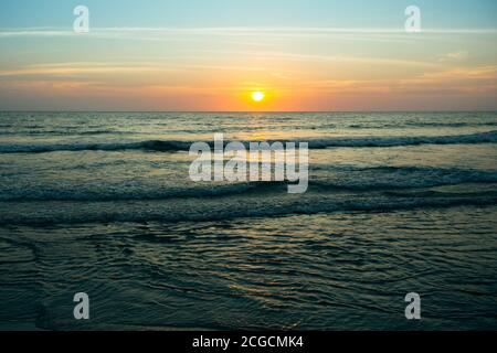 Seascape in cool tones during beautiful sunset. Stock Photo