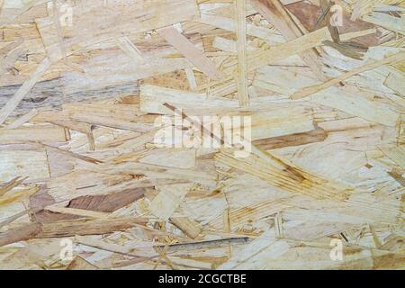 chipboard texture - recycled wood waste used to produce building materials Stock Photo