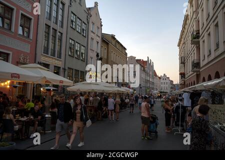 Gdansk, North Poland - August 15, 2020: People are walking in the city center main square in the old town after masks were not mandatory to wear outdo Stock Photo