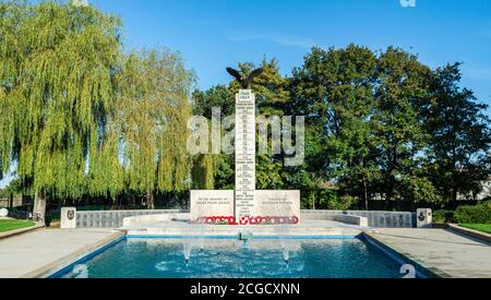 Inside the Polish War Memorial on a sunny day with fountain and poppies, Located close to RAF Northolt Airport. South Ruislip, Middlesex, England, UK. Stock Photo