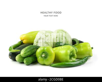 Green vegetables: cabbage, cucumbers, peppers, zucchini on a white background with space for copying. Stock Photo