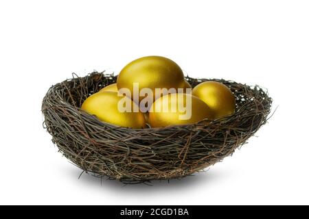 Golden eggs in decorative nest isolated at white background Stock Photo