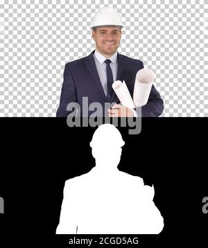Smiling architect or engineer walking while keeping projects in arms Labor concept, Alpha Channel Stock Photo