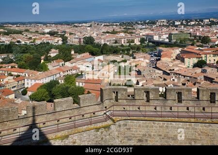 View over the battlements of the castle to the lower town from La Cite, Carcassonne, Languedoc-Roussillon, France Stock Photo