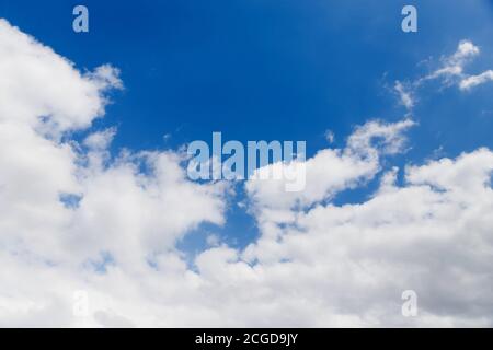 Deep blue sky with white clouds on day light Stock Photo