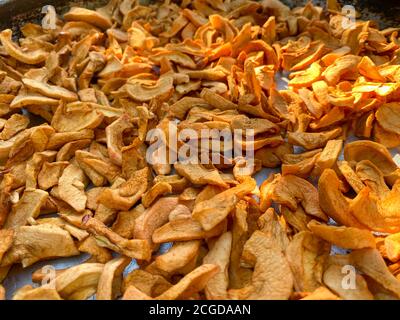background of sliced dried apples. Dried fruits Stock Photo