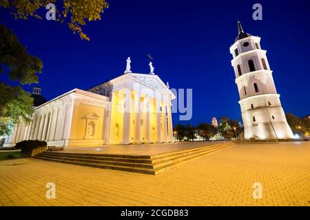 Night view of illuminated Cathedral Basilica of St Stanislaus and St Ladislaus at Cathedral Square in the Old Town of Vilnius, Lithuania