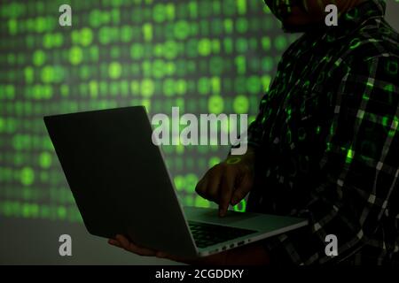 dark web hooded hacker cyber war concept Stock Photo