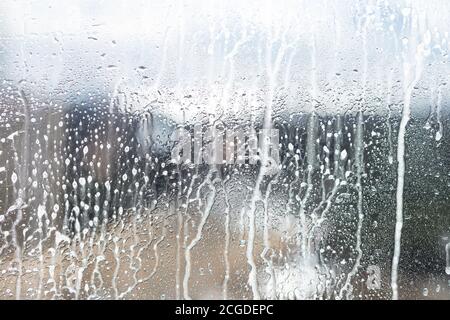 Cleaning background texture - chemical soap detergent foam on a clear glass Stock Photo