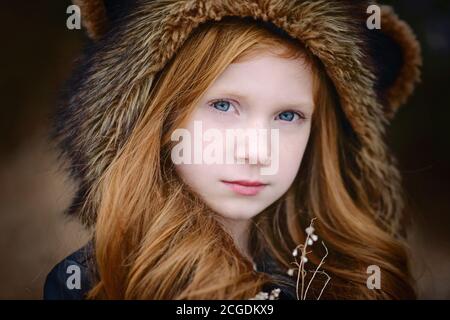 Young Girl Long Red Hair Wearing Bear Spirit Hood Stock Photo