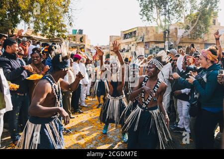 Tribal people performing a dance during the parade Jaisalmer Desert Festival Stock Photo