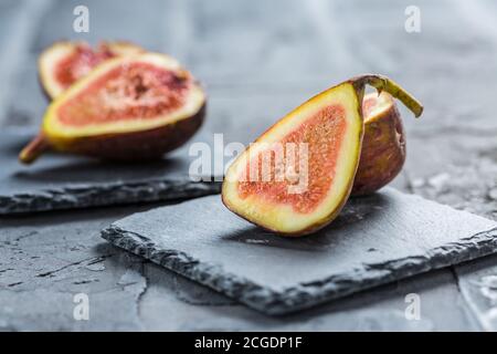 Fresh organic figs on black background Stock Photo