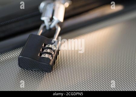 small Luggage lock, magnetic closure combinations, safety on the road Stock Photo
