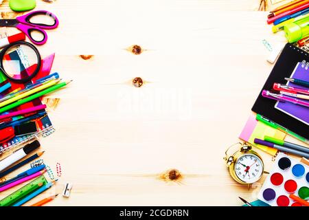 Back to school background with space for text, notebooks, pens, pencils, other stationery on light wooden school desk, education concept, flat lay, to Stock Photo