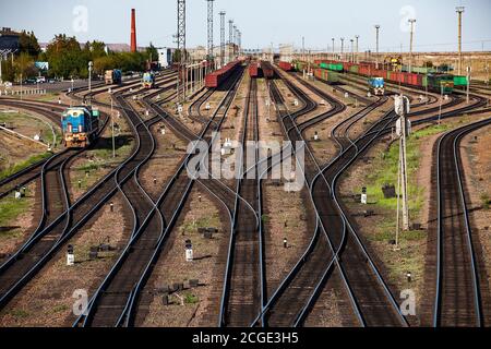 Railway station 'Bogatyr' near coal quarry. Rails and trains panorama. Kazakhstan, Ekibastuz. Stock Photo