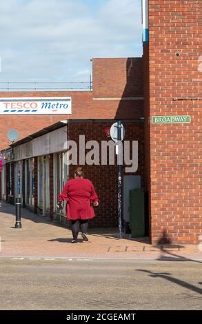 Maidenhead, Berkshire, UK. 10th September, 2020. An obese lady crosses the road. The Government are advising people to lose weight as overweight people are more likely to get serious complications if they contract Covid-19. The number of cases of positive Covid-19 tests in the Royal Borough of Maidenhead and Windsor has risen by 10 cases in the past 24 hours. Due to a spike of new cases in various parts of England, new restrictions have been put in place by the Government from Monday next week whereby only six people may now socialise together. There are some limited exceptions to this. Credit Stock Photo