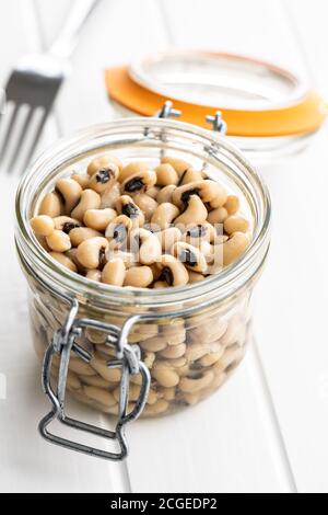 Marinated black eyed beans in jar. Stock Photo